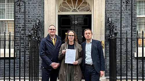 Alison presenting the petition at Downing Street