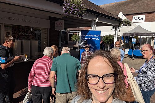 Alison standing in front of Haywards Heath Town Council Pop Up Surgery