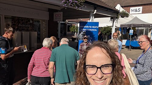 Alison standing in front of Haywards Heath Town Council Pop Up Surgery
