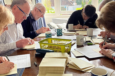 Volunteers addressing envelopes