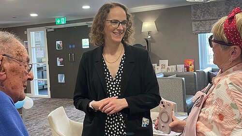 Alison talking to residents