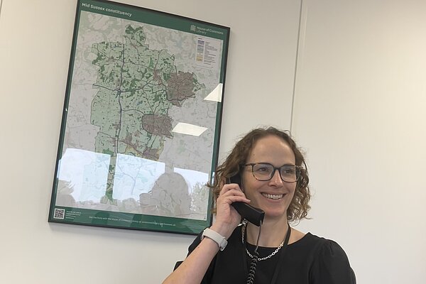 Alison taking a phonecall